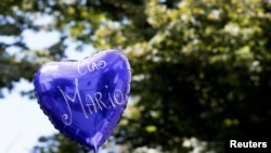 A balloon reading 'Ciao Mario ('goodbye Mario') is seen outside the church of Santa Croce before the funeral of slain Carabinieri military police officer Mario Cerciello Rega, in his hometown Somma Vesuviana, Italy, July 29, 2019.