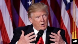 FILE - President-elect Donald Trump gives his acceptance speech during his election night rally, Nov. 9, 2016, in New York. 