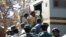 Suspected demonstrators make a court appearance in Harare, Zimbabwe, Aug. 29, 2016.