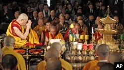 The Dalai Lama, Tibet's spiritual leader, prays for victims of the March 11 earthquake and tsunami disaster in Japan at Buddhist temple in Tokyo, April 29, 2011.