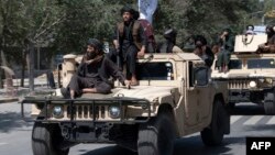 ফাইল ছবি - সশস্ত্র তালিবান যোদ্ধারা কাবুলে যুক্তরাষ্ট্রের নেতৃত্বাধীন সেনা প্রত্যাহারের বার্ষিকী উদযাপন করছে। (৩১ আগস্ট, ২০২২)