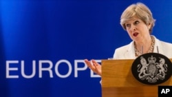 PM Inggris Theresa May saat berbicara pada KTT Uni Eropa di Brussels (23/6). 
