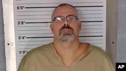This booking photo provided by Leslie County Detention Center in Kentucky on Friday, Sept. 20, 2024 shows Letcher County Sheriff Shawn M. Stines (Leslie County Detention Center via AP)