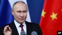 资料图： 俄罗斯总统普京2024年5月17日在中国哈尔滨一所大学发表讲话。（克里姆林宫照片）