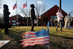 Voters are seen lined up for the U.S. Senate run-off election, at a polling location in Marietta, Georgia, Jan. 5, 2021.