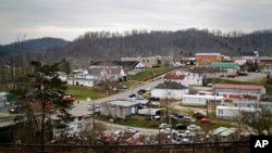 Main Street, center, cuts through Sandy Hook, Ky., Dec. 14, 2017. 