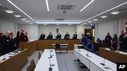 በተለያዩ የአውሮፓ አገሮች የጦር መሳርያዎችን በመደበቅ እና በማከማቸት የተጠረጠሩ አራት የሐማስ አባላት የፍርድ ሂደት፣ ጀርመን፡ በርሊን፡፡ የካቲት 18 ቀን 2017 ዓ.ም.