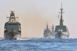 FILE - Warships from Greece, Italy, Cyprus and France, participate in a joint military exercise which was held from 26-28 of August, south of Turkey in eastern Mediterranean sea, Aug. 31, 2020.