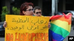Supporters of the LGBT (Lesbian, Gay, Bisexual, and Transgender) community attend a sit-in to protest the ongoing criminalization of homosexuality and arbitrary arrests, in front of Hobeich Police Station, where protesters say four men are being…