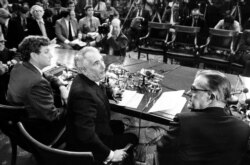 FILE - Chairman Peter Rodino, D-N.J., of the U.S. House of Representatives Judiciary Committee, center, chief counsel John Doar, left, and minority counsel Albert Jenner, right, gather for a news conference in Washington, March 5, 1974.