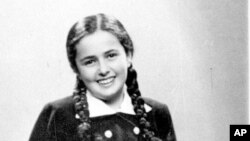 This photo shows a 13-year-old Eva Heyman photographed in Hungary months before she was murdered in a Nazi concentration camp in 1944.