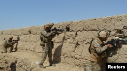 Pasukan keamanan Afghanistan mengambil posisi selama pertempuran dengan Taliban di provinsi Kunduz, Afghanistan 1 September 2019. (Foto: Reuters)