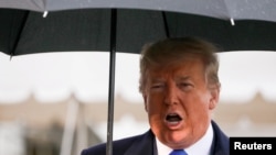 Presiden AS Donald Trump memberikan keterangan kepada media di halaman Gedung Putih, Washington, D.C., sebelum bertolak ke London, Inggris untuk menghadiri pertemuan NATO, 2 Desember 2019. 