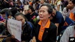 A supporter of Thailand's Future Forward Party cries as they watch a live television broadcast of a court verdict at their party's headquarters in Bangkok, Thailand, Friday, Feb. 21, 2020. Thailand's Constitutional Court on Friday ordered the…